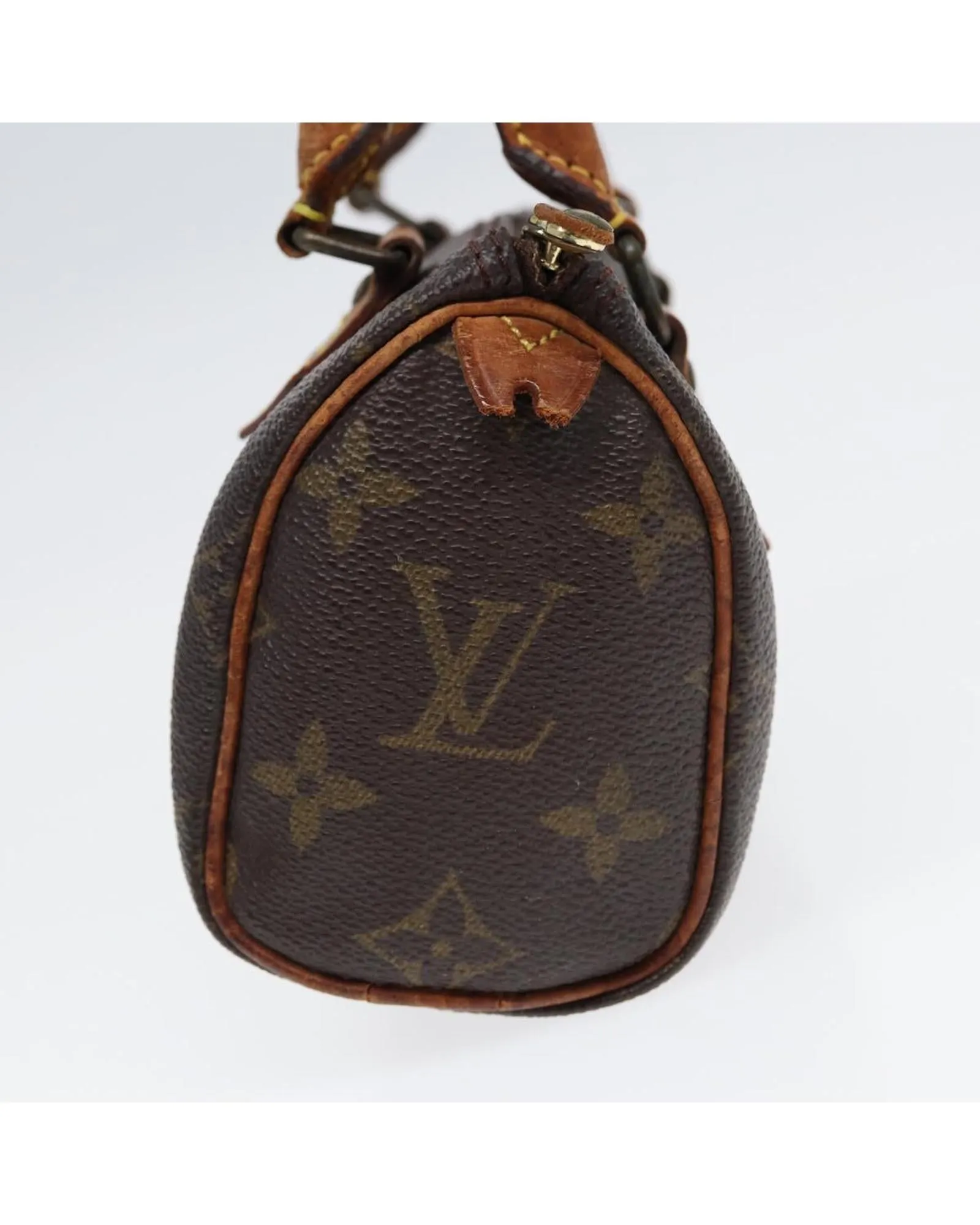 Monogram Mini Speedy Hand Bag in Canvas with Signs of Wear